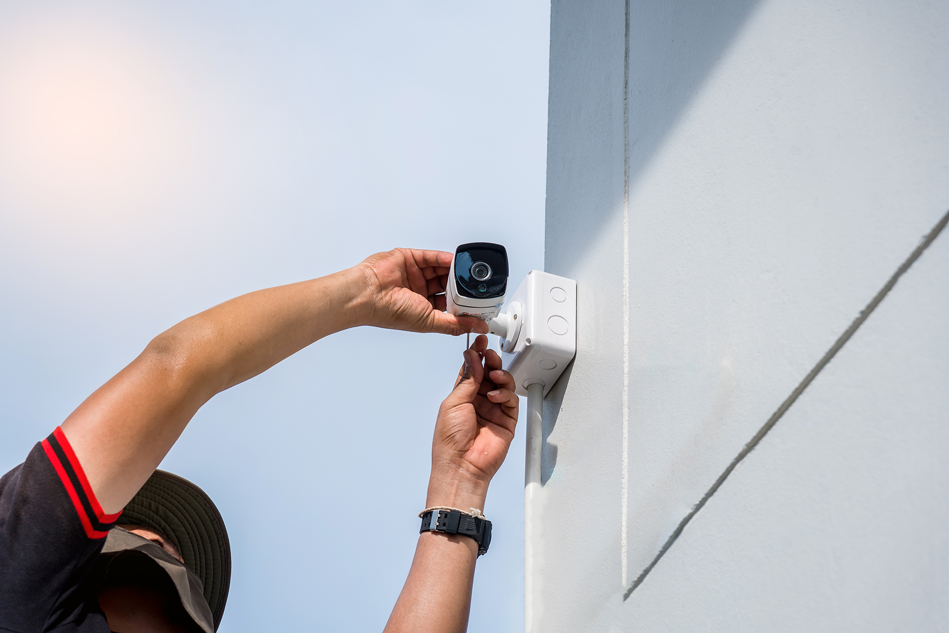 Technician Installing CCTV